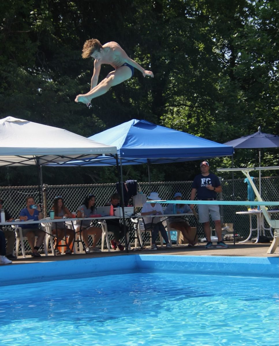 Stanton mid-dive during a meet for the summer season.
