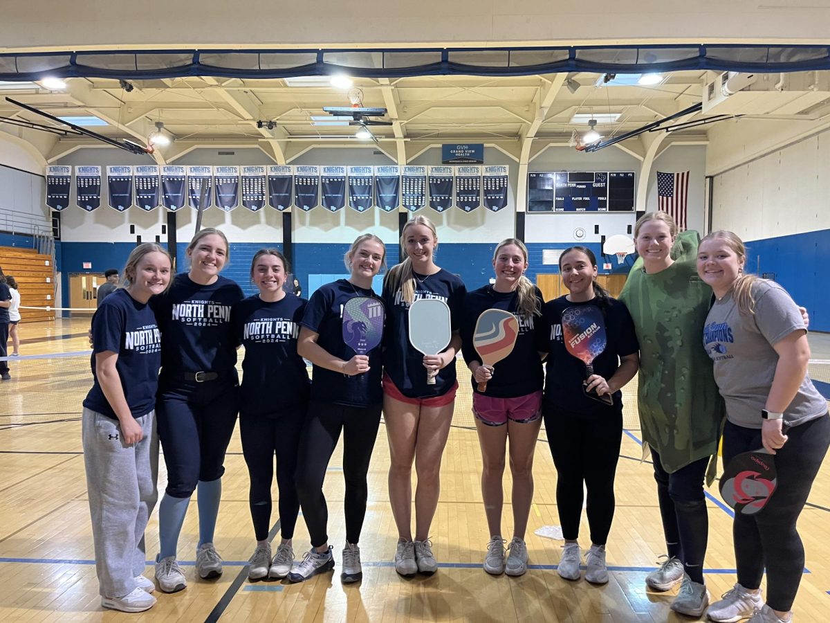 Members of the North Penn Girls Softball team face off in a battle to become the North Penn pickleball champions.