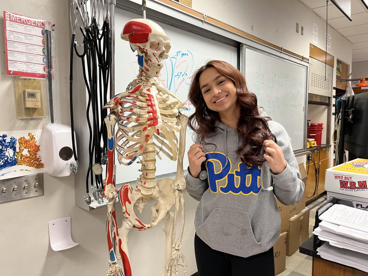 Senior, Farhana Meme poses in her Advanced Biology classroom.