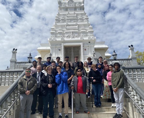 Namaste! Students in Mr. Knaubs World Religions course pose in front of Bharatiya Temple, which is located on County Line Rd.