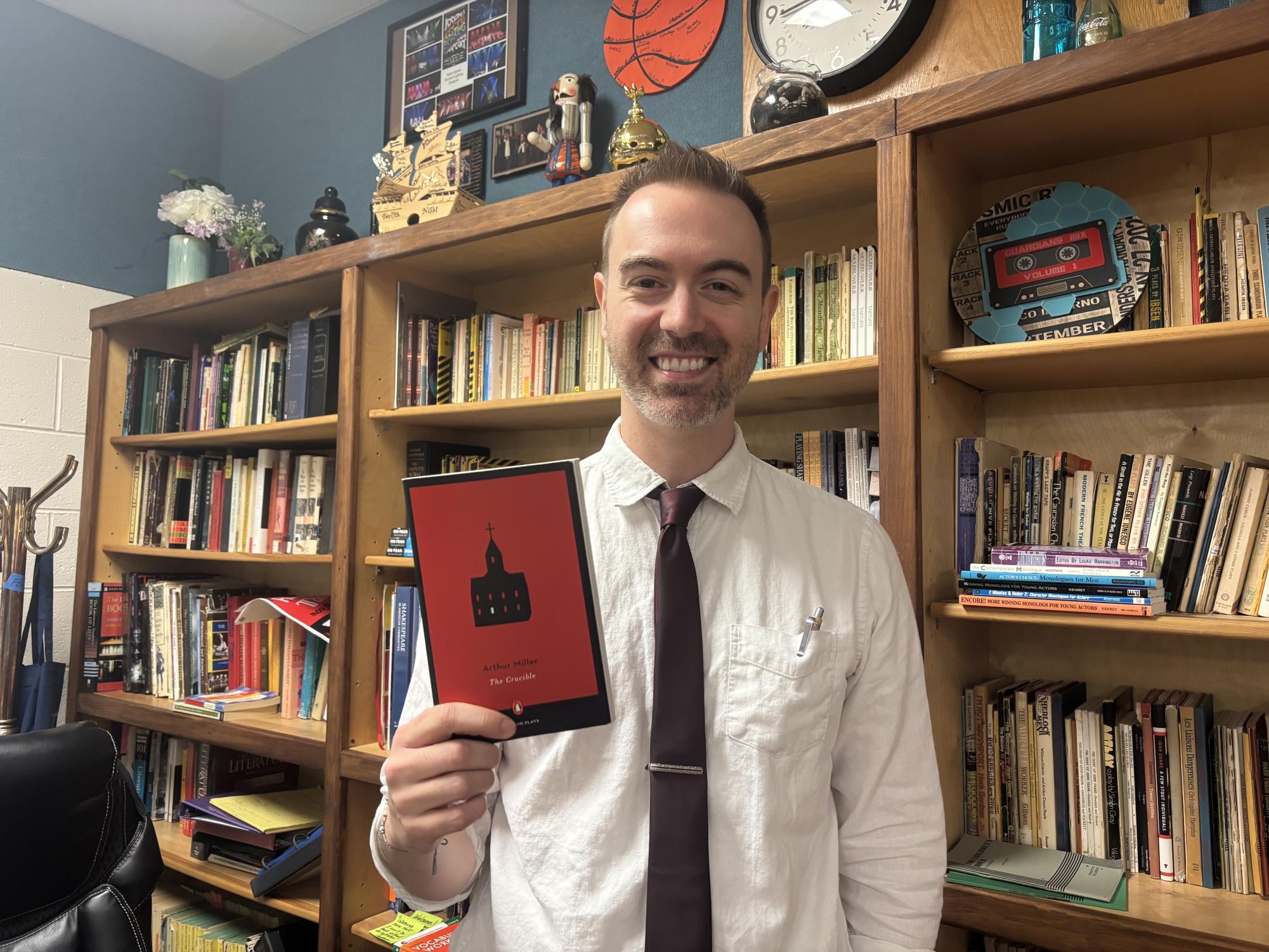 Mr. Dake holding The Crucible, this year's fall production