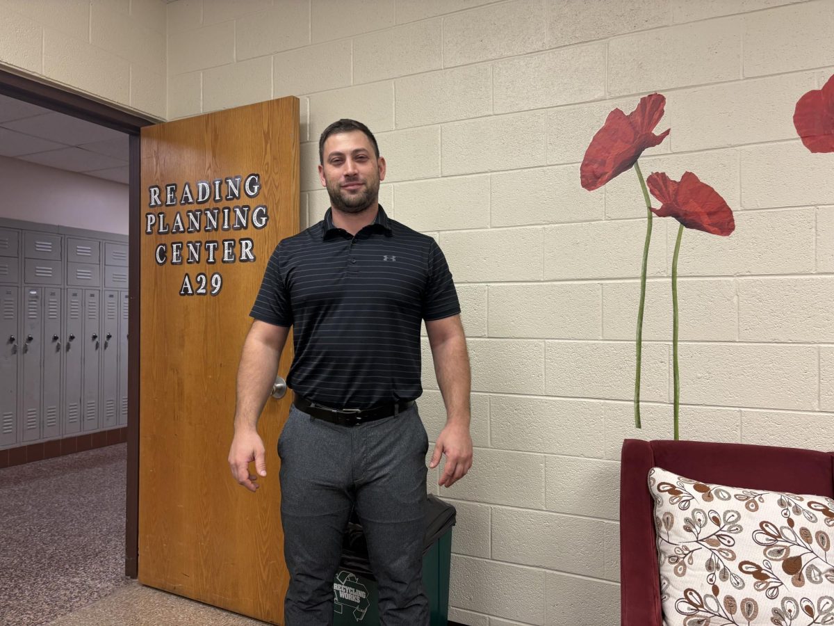 Mr. Spahits in his classroom preparing for the day.