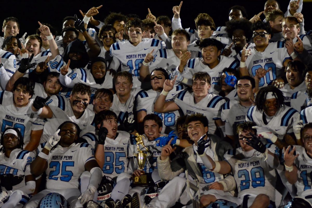 The Knights pose with their trophy for the first time.