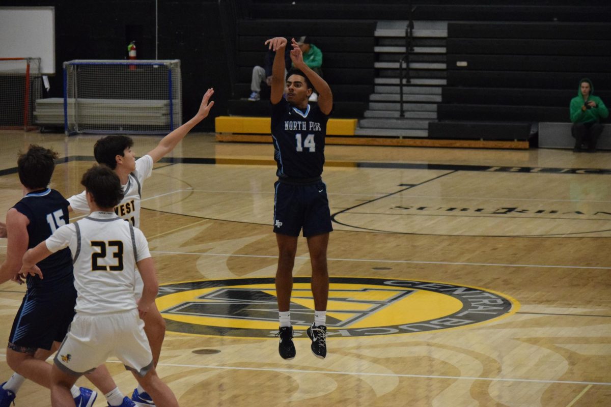 North Penn's JC Wood goes up for a three-pointer from the top of the key in Tuesdays game at Central Bucks West.