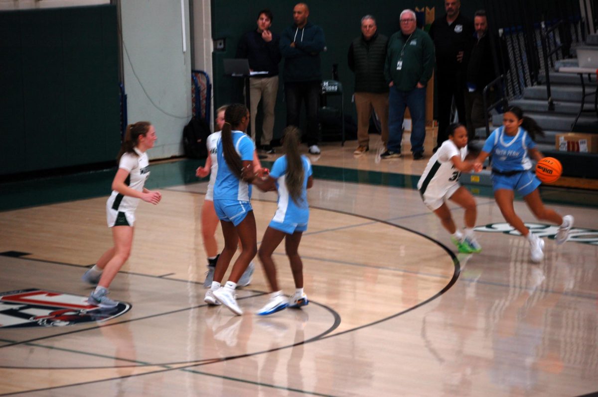 North Penn sophomore Ava Wood attempts to attack the lane.
