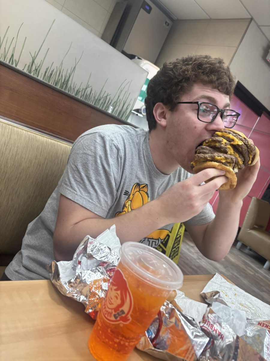 A person with T-Rex sized arms would have serious trouble handling Wendy's new T-Rex Burger. 
