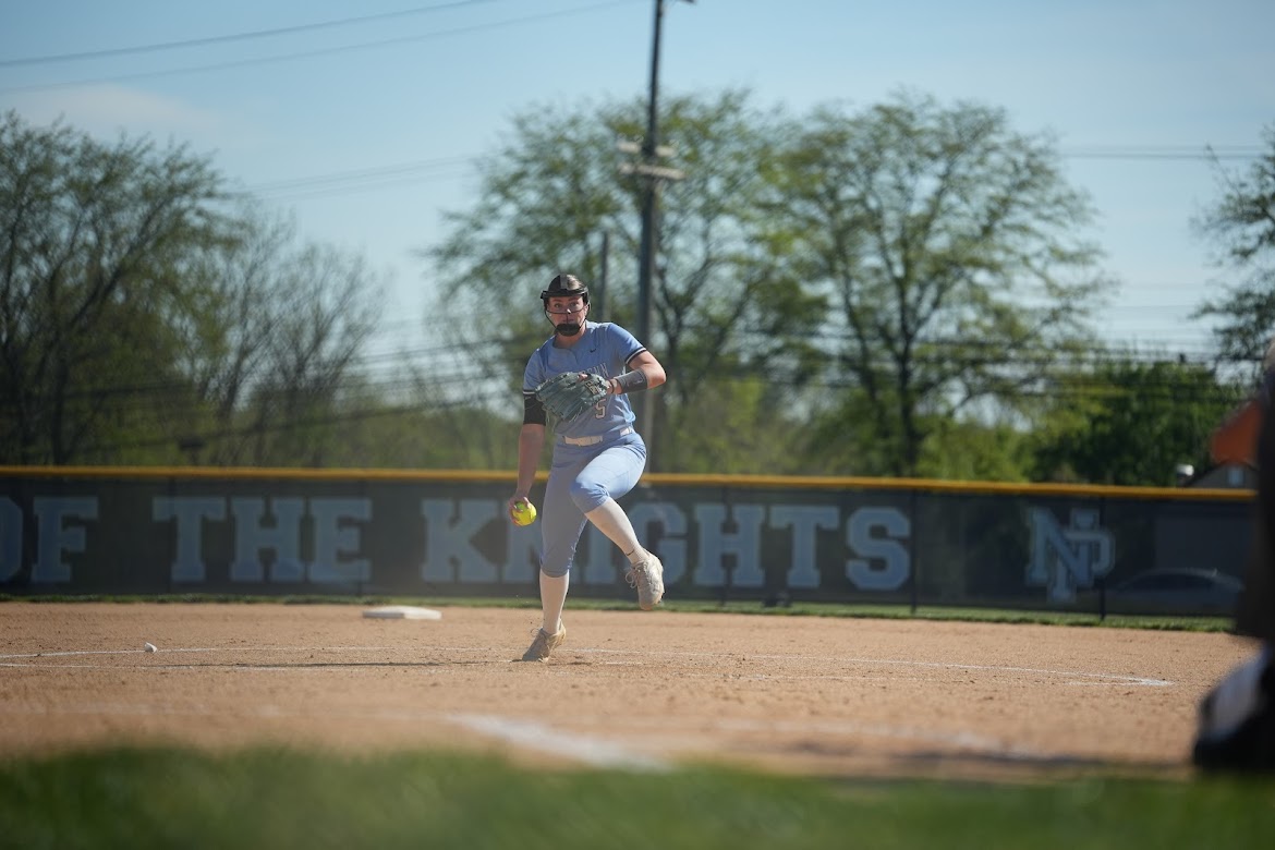 Senior Felicia Connolly throws a pitch at home.